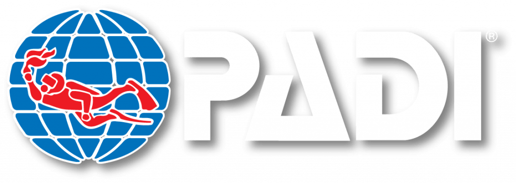 Logo of PADI, featuring a red scuba diver silhouette against a blue globe on the left, with large white lettering "PADI" to the right.